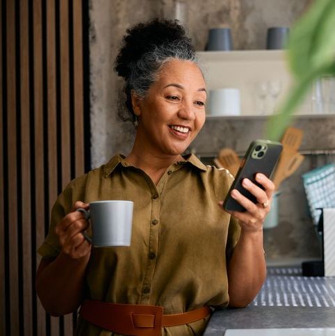 Person reviewing their investments on a phone