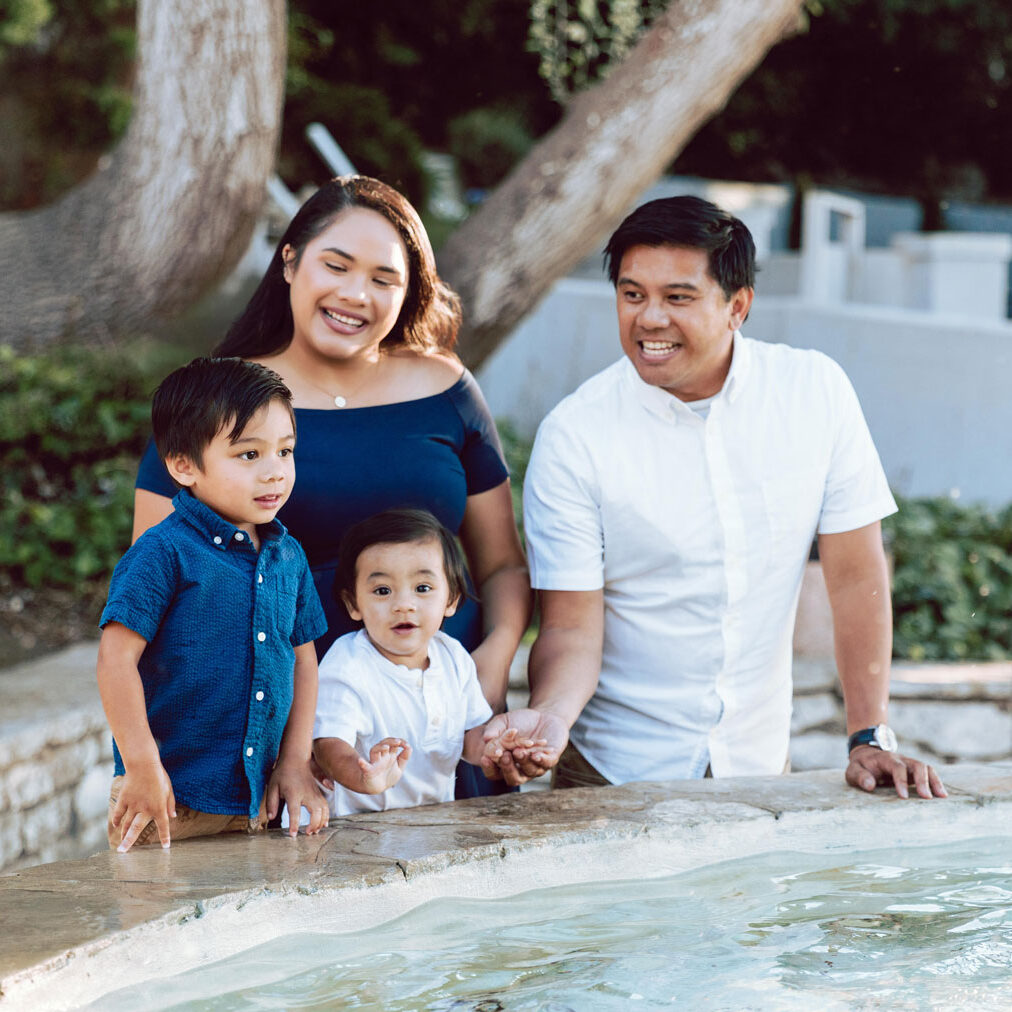 a family hanging out at the park